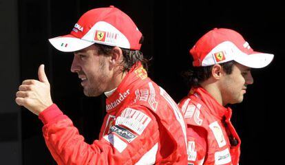 Fernando Alonso (l) is staying at Ferrari next year, while Felipe Massa is on the way out.