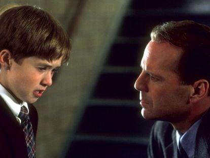 Haley Joel Osment (l) and Bruce Willis, in a scene from ‘The Sixth Sense.’