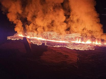 A volcano erupts in Reykjanes, Iceland, in a photo taken from a Coast Guard helicopter.