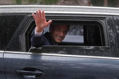 French President Emmanuel Macron leaves after voting in Le Touquet, northern France, on June 19.