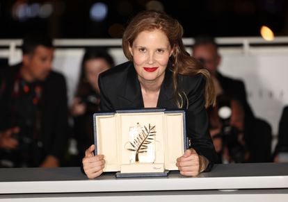 Justine Triet, winner of the Palme d'Or for 'Anatomy of a Fall,' poses for photographers following the awards ceremony at the 76th international film festival Cannes, on May 27, 2023.