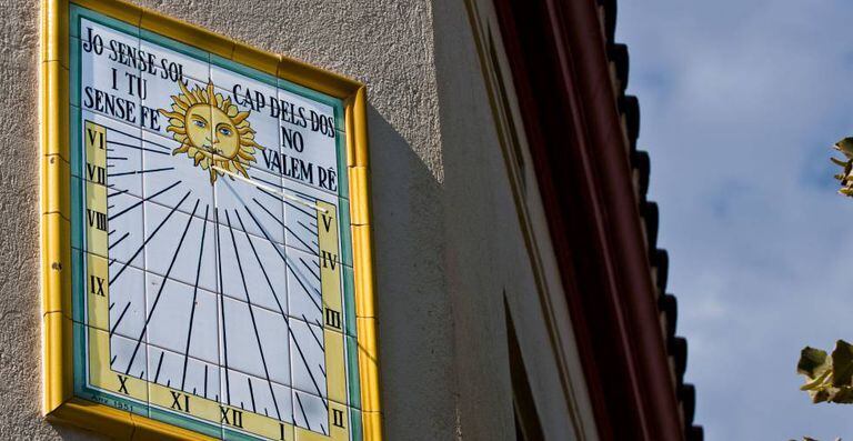 A sun dial on Mossèn Vives street in Barcelona.