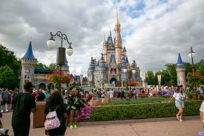 People visit Magic Kingdom Park at Walt Disney World Resort in Lake Buena Vista, Florida, on Friday, April 22, 2022.