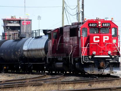 Canadian Pacific trains sit idle on the tracks due to a strike at the main CP Rail train yard in Toronto, on March 21, 2022.