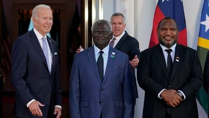 President Joe Biden poses for photos with Pacific Island leaders including Solomon Islands Prime Minister Manasseh Sogavare, center, and Papua New Guinea Prime Minister James Marape on the North Portico of the White House in Washington, Sept. 29, 2022.