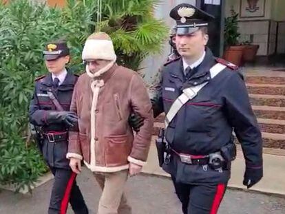 A screengrab taken from a video shows Matteo Messina Denaro the country's most wanted mafia boss being escorted out of a Carabinieri police station after he was arrested in Palermo.