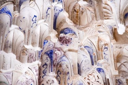 A detail of the plasterwork at the Alhambra, showing blue and purple smudges.