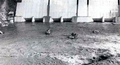 Trucks and machinery swept away by the waters on October 22, 1965.