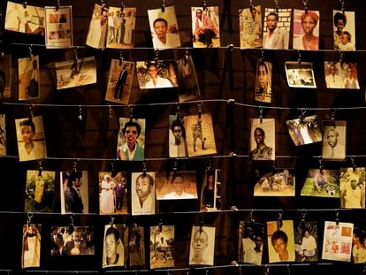 Family photographs of some of those who died hang on display in an exhibition at the Kigali Genocide Memorial centre in the capital Kigali, Rwanda on April 5, 2019.