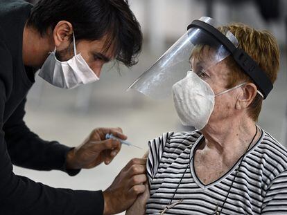 A woman receives the Covid-19 vaccine in Argentina.