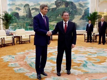 U.S. Special Presidential Envoy for Climate John Kerry and Chinese Premier Li Qiang shake hands before a meeting at the Great Hall of the People in Beijing, China, on July 18, 2023.