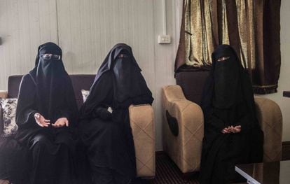 Three of the women being held in a Kurdish-controlled camp in Syria.