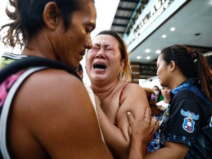 The relative of a victim mourns at the Binangonan port, after a passenger boat capsized off Binangonan, in Rizal province, Philippines, 27 July 2023.