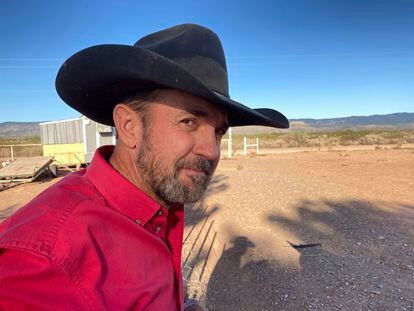 In this May 12, 2021, file photo, Otero County Commissioner Couy Griffin, the founder of Cowboys for Trump, takes in the view from his ranch in Tularosa, N.M.