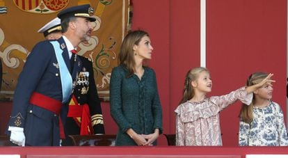 King Felipe, Queen Letizia, the Princess of Asturias and the &lsquo;infanta&rsquo; Sof&iacute;a during a military parade in October.  