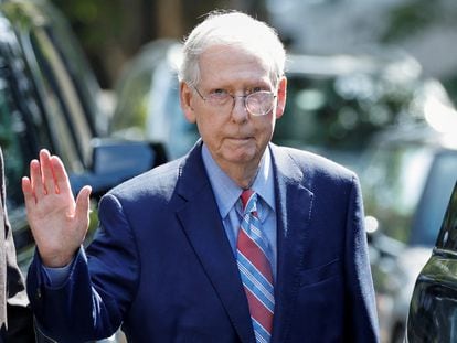 U.S. Senate Minority Leader Mitch McConnell (R-KY) waves as he leaves his Washington house to return to work at the U.S. Senate, on September 5, 2023.