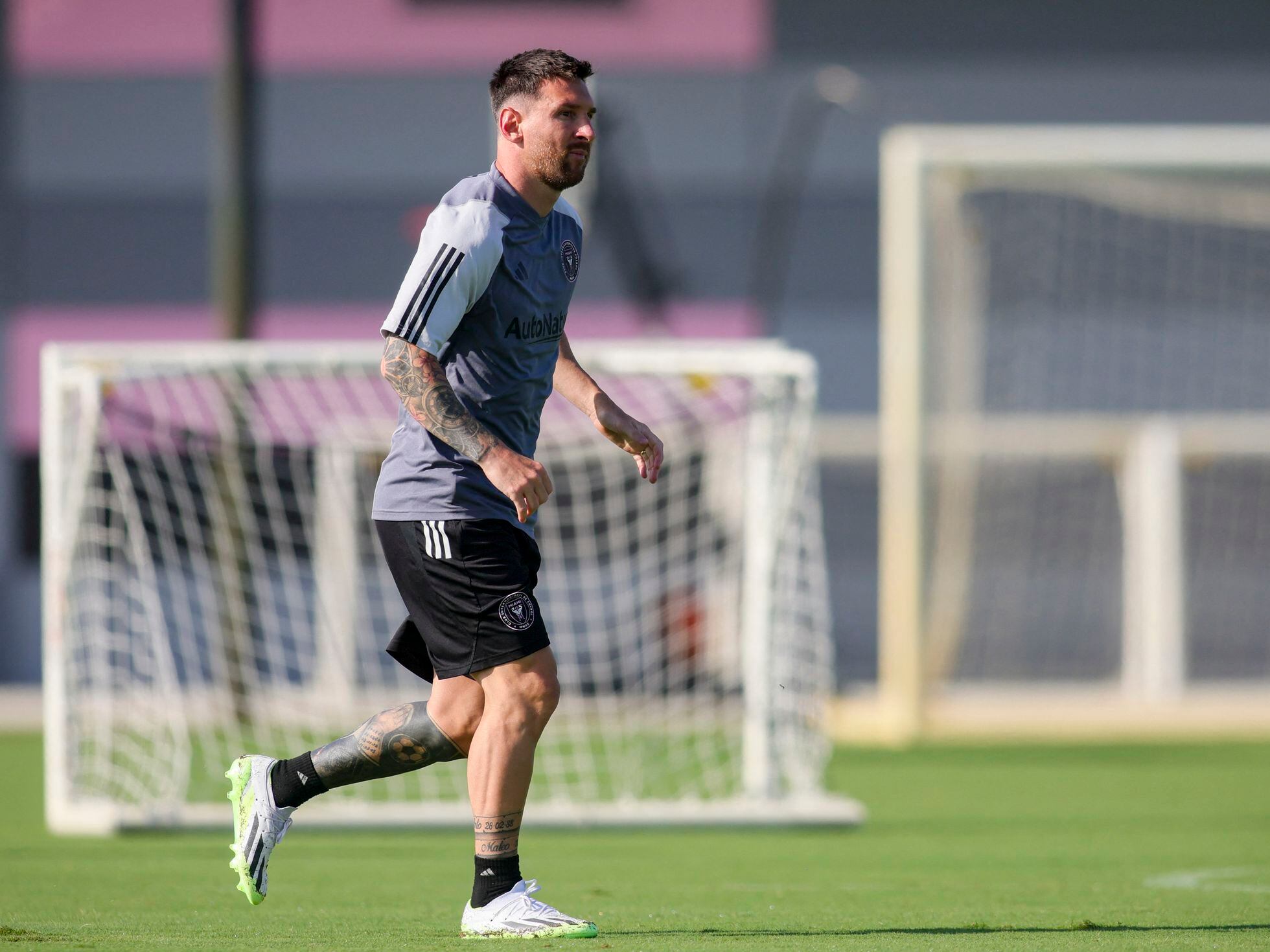 Lionel Messi takes to the practice field for first time since