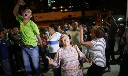 Opposition supporters celebrate the victory in Caracas.