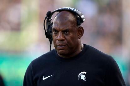 Coach Mel Tucker walks the sideline during the second half of an NCAA college football game against Richmond, on Sept. 9, 2023, in East Lansing, Mich.
