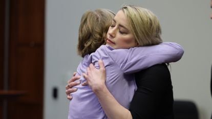 Amber Heard hugs her lawyer Elaine Bredehoft after the verdict was announced.
