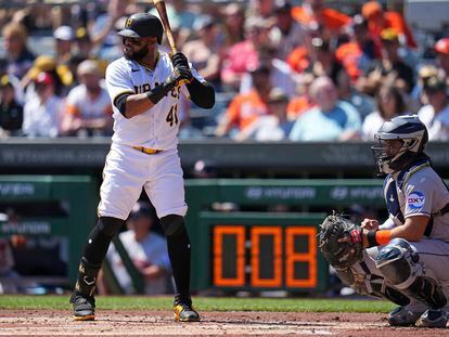 The pitch clock counts down as Pittsburgh Pirates' Carlos Santana (41) waits for a pitch from Houston Astros starting pitcher Jose Urquidy during the first inning of a baseball game in Pittsburgh, Wednesday, April 12, 2023. (AP Photo/Gene J. Puskar)