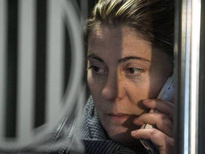 Nadia’s mother speaks on the phone at the courthouse in La Seu d'Urgell.