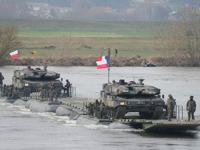 Polish troops and other NATO personnel participate in military maneuvers in Korzeniewo, Poland, on March 4, 2024.