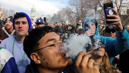 A man smokes cannabis in Denver.
