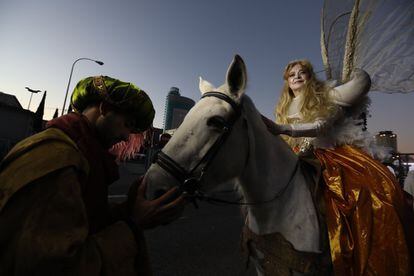 A woman rides a horse in the parade in Madrid.