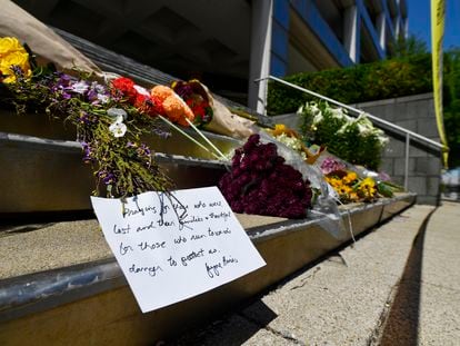 Flowers and a message of hope sit on the steps of the Old National Bank in Louisville, Kentucky, on April 11, 2023.