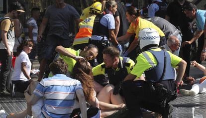 A victim being treated following the La Rambla attack.