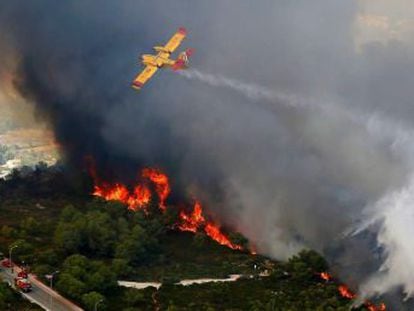 Regional leader calls the blaze “environmental terrorism.” 1,400 evacuated residents return to their homes