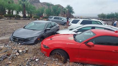 About 60 cars were trapped in the mud and debris.