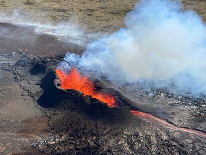 Lava spurts and flows after the eruption of a volcano in the Reykjanes Peninsula, Iceland, July 12, 2023