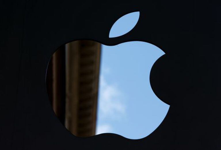 The Apple Inc logo sits on display outside the company's store in Amsterdam, the Netherlands.