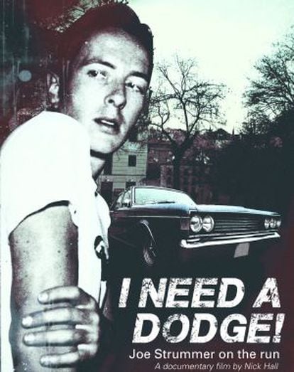 Clash frontman Joe Strummer with a Dodge in the background.
