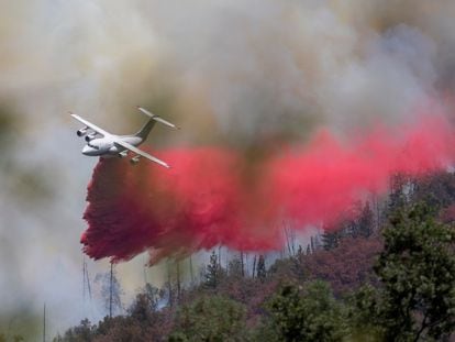 A fire retardant drop at the Oak Fire near Mariposa, California, on Sunday,