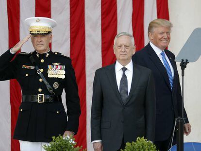 Trump and US defense secretary James Mattis at a ceremony commemorating war dead at Arlington.