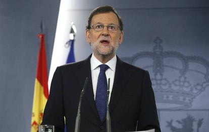 Acting PM Mariano Rajoy at a press conference on Friday.
