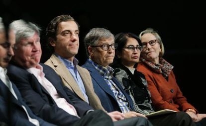 Bill Gates (center) attends a Microsoft shareholders’ meeting in Bellevue, Washington.