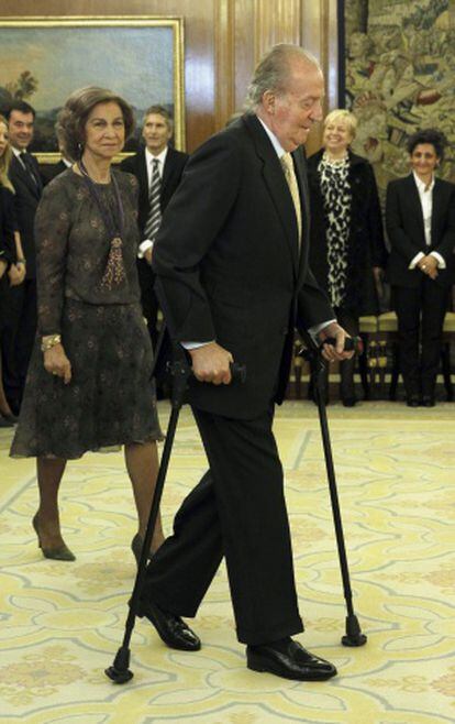 King Juan Carlos reappears in public in December nine days after his last operation.