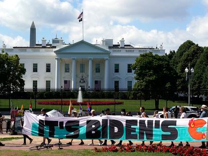 Climate activists rally in front of the White House at Lafayette Square to demand that President Joe Biden declare a climate emergency, July 4, 2023.