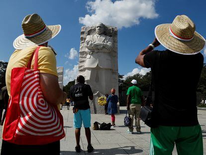 People visit Martin Luther King, Jr. Memorial as demonstrators for racial justice march on the 60th anniversary of the March On Washington and Martin Luther King Jr's historic "I Have a Dream" speech at the Lincoln Memorial in Washington D.C, U.S., August 26, 2023.