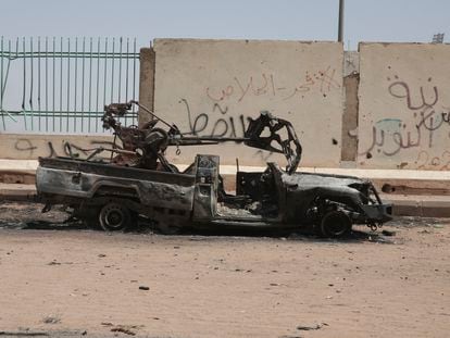 A destroyed military vehicle is seen in southern in Khartoum, Sudan, Thursday, April 20, 2023