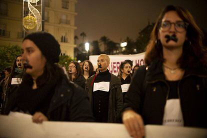 Hundreds of women take part in a march against gender violence in Seville.