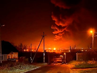 Smoke and flames at oil storage facilities hit by fire in Bryansk, Russia on April 25, 2022.