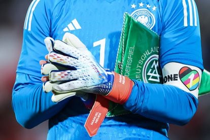 Germany goalkeeper Manuel Neuer wears the captain's armband with the inscription "One Love" during a pre-World Cup friendly against Oman.