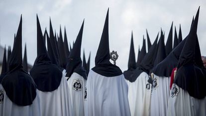 Nazarenes, or members of ‘El Cachorro’ religious brotherhood in Seville during processions on Good Friday.