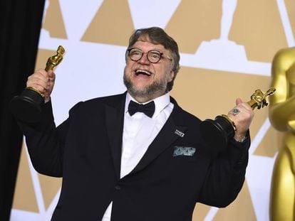 Guillermo del Toro with his two awards.