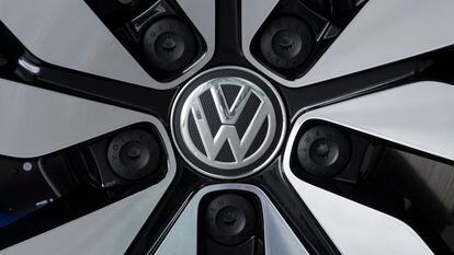 An e-Golf electric car with the VW logo on a rim is pictured in the German car manufacturer Volkswagen Transparent Factory in Dresden, eastern Germany, in April 2017.